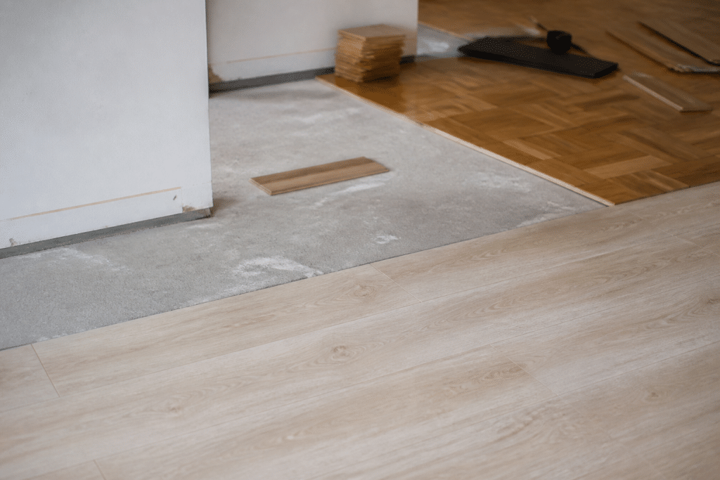 Pieces with beige laminate flooring and parquet wooden boards installed